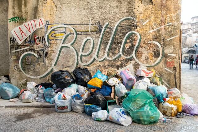 Garbage on the street corner in Sicily.